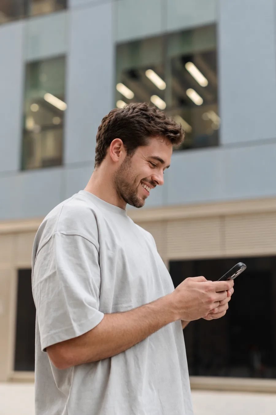 A founder checking his app on a phone